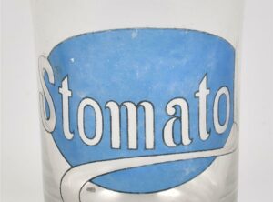 Tannglass med reklame for STOMATOL TANN-CREME