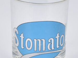 Tannglass med reklame for STOMATOL TANN-CREME (lite glass)